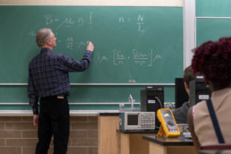 A professor of engineering at Thompson Rivers University gives a lecture on magnetism.